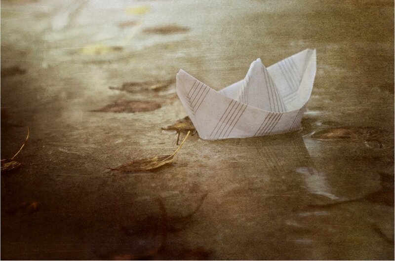 Paper Boat in Water