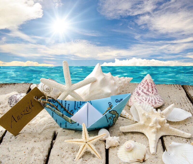Paper Boat on Beach