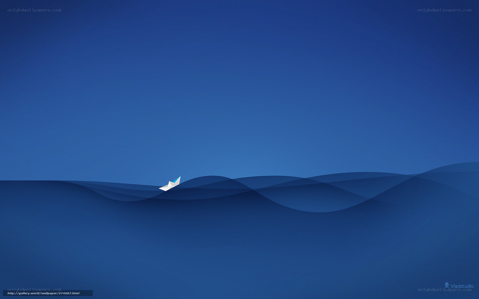 Paper boat on blue waves