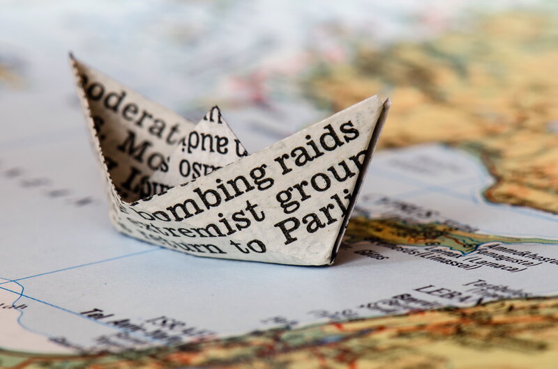 Paper Boat on Map