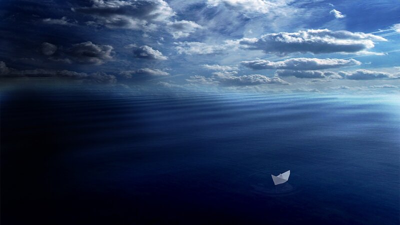 Paper Boat on Ocean
