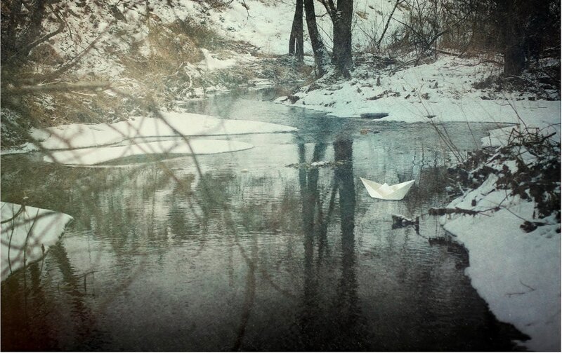Paper Boat on River