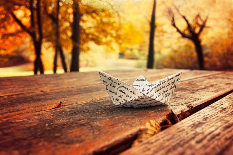Paper Boat on Table