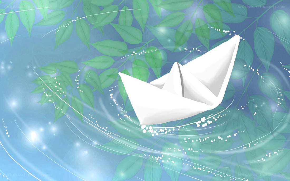 Paper boat on water