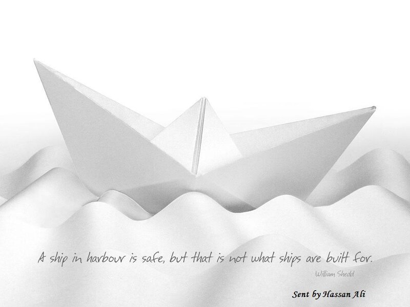 Paper boat on waves