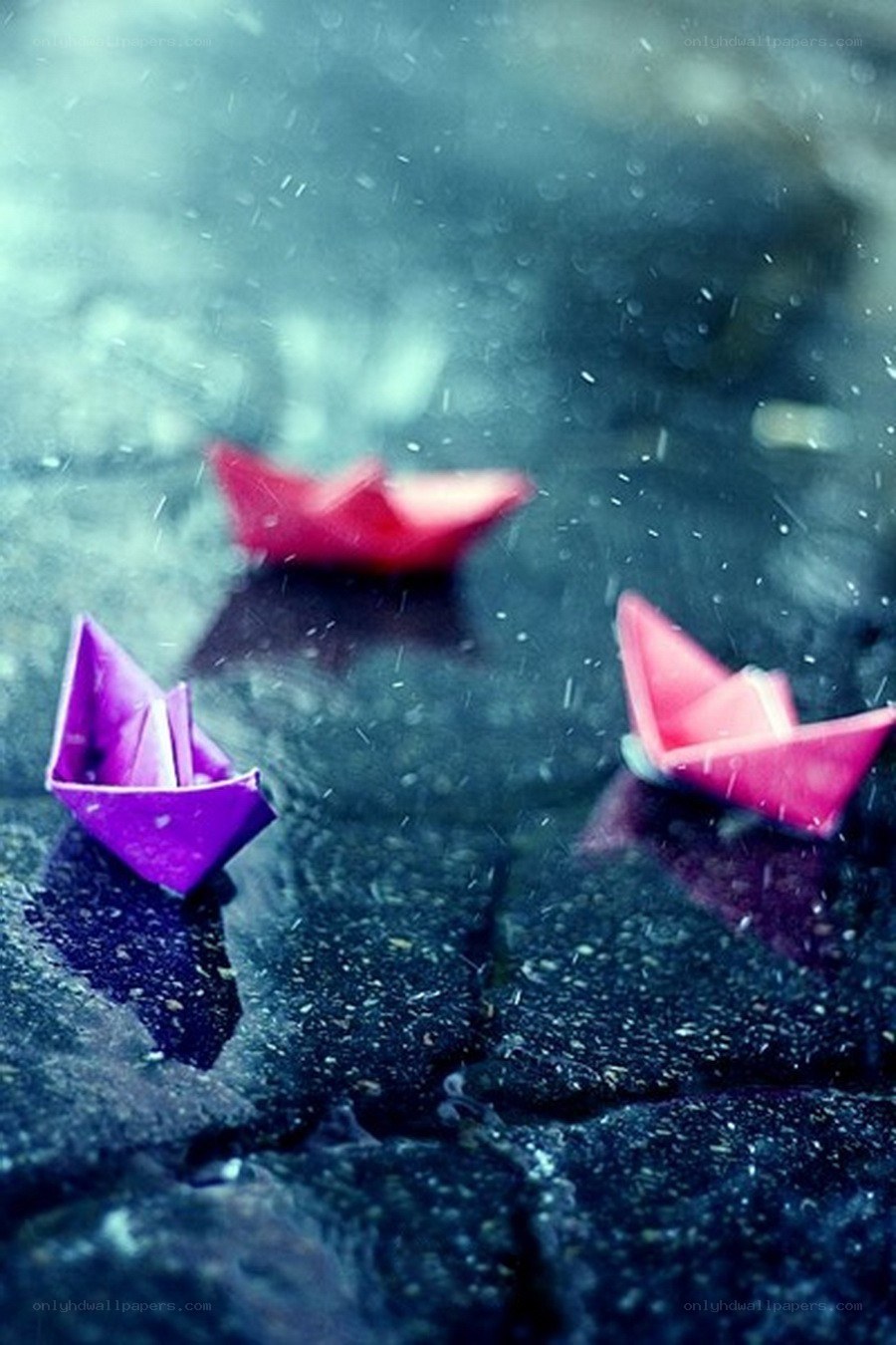 Paper boats in the rain