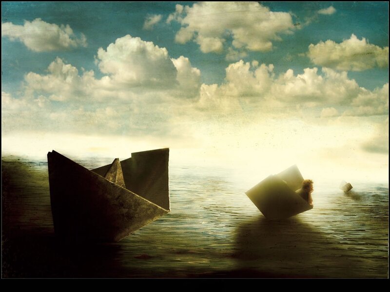 Paper boats on calm water
