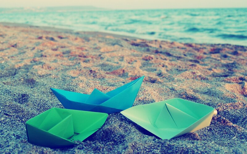 Paper Boats on Sand
