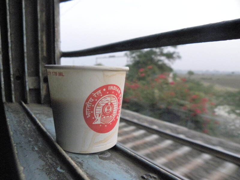 Paper cup on train window
