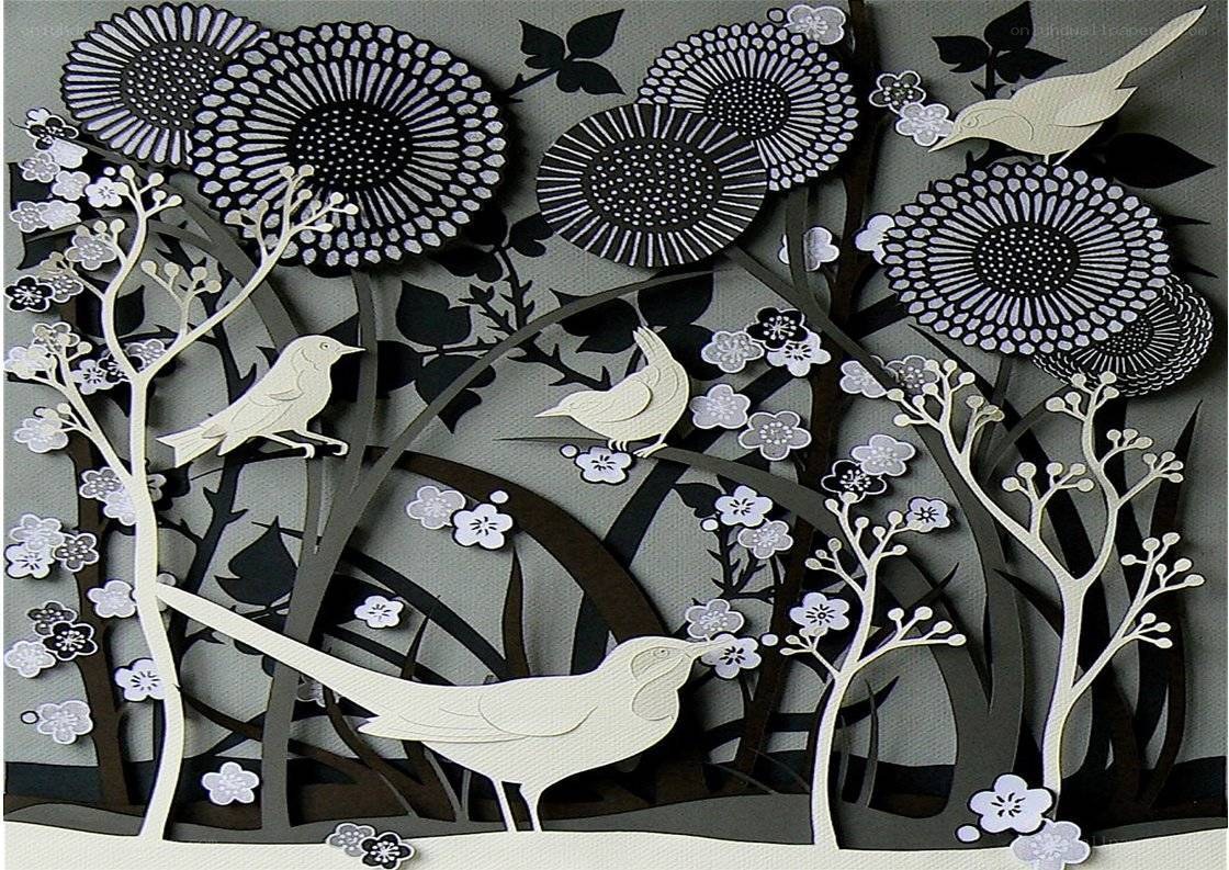 Paper cutout birds and flowers