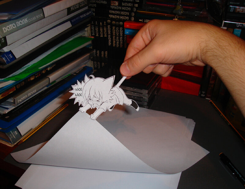 Paper cutout of anime character