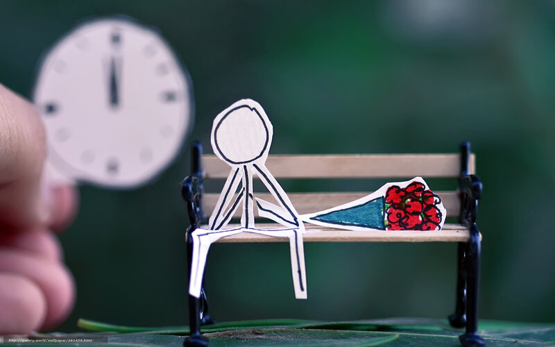 Paper figure on bench