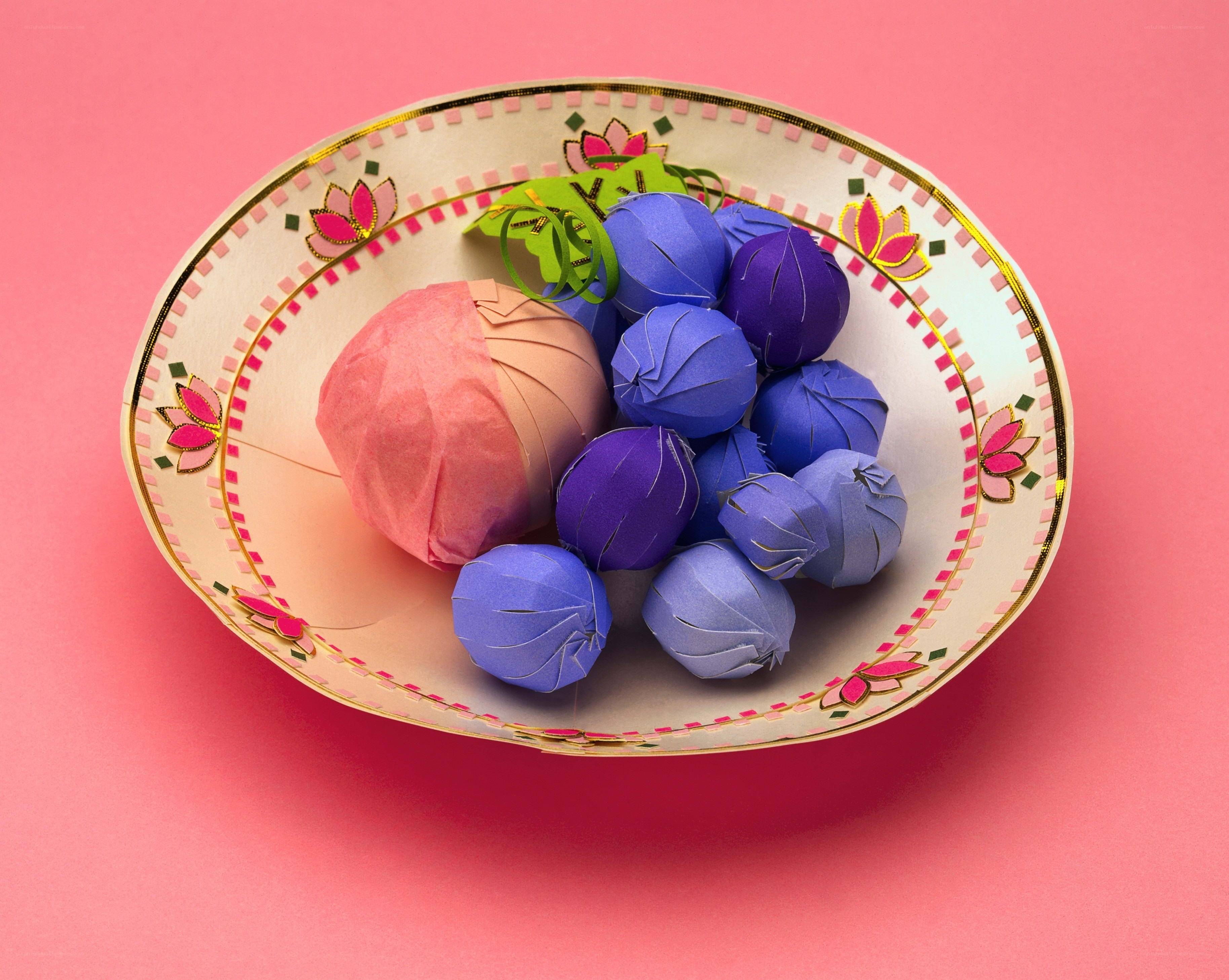Paper fruit in a decorative bowl