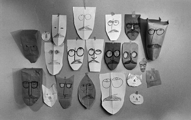 paper masks with drawn faces