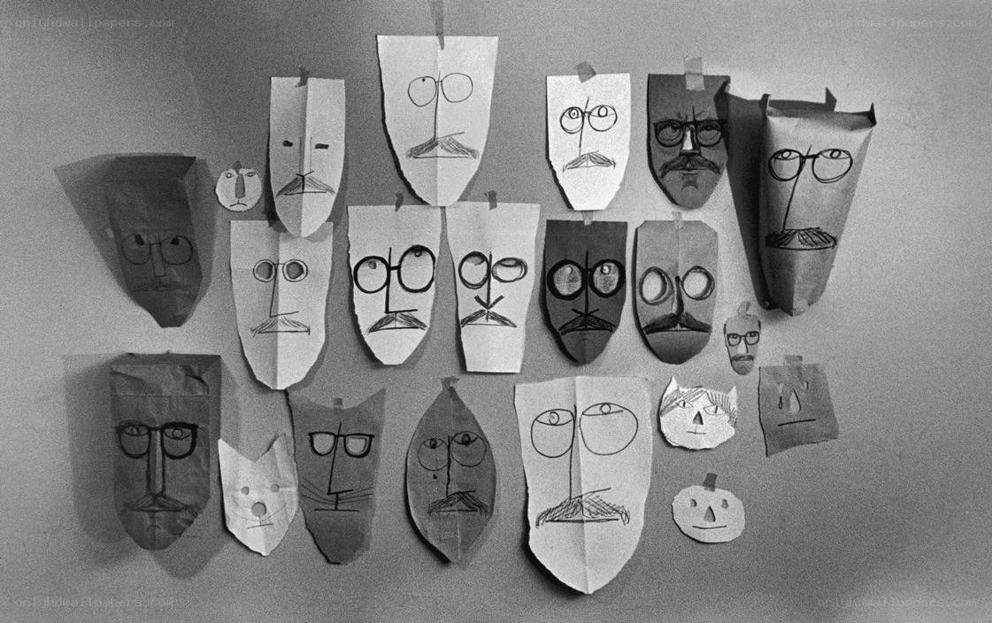 paper masks with drawn faces