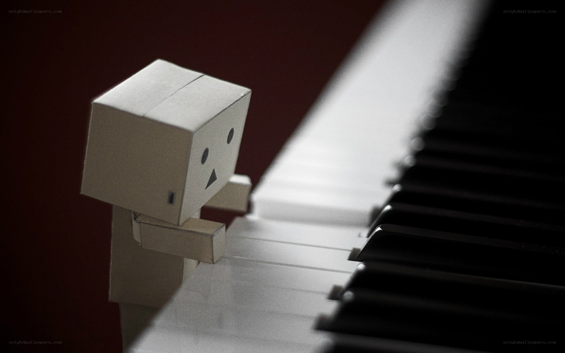 paper robot at piano
