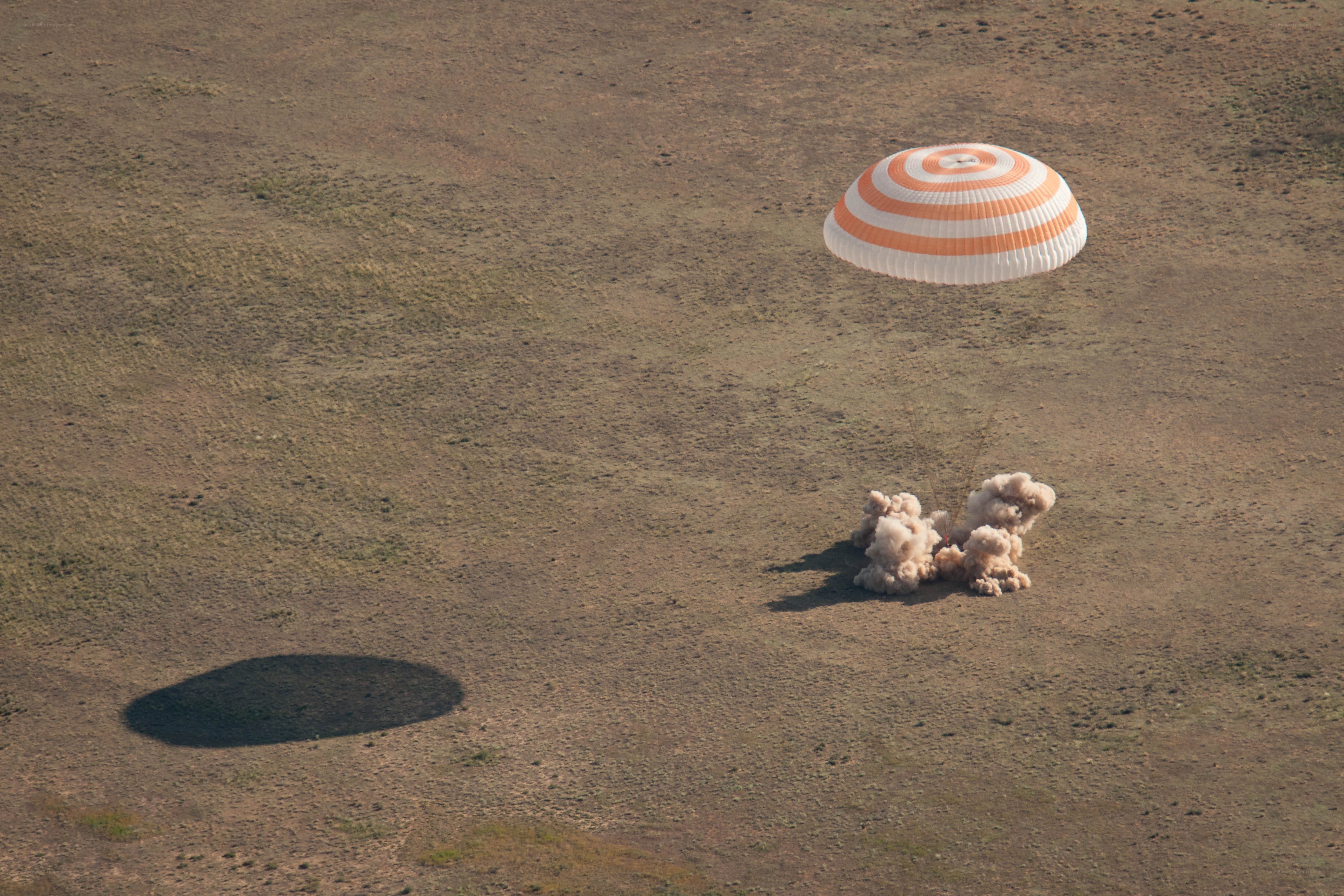 Parachute landing on desert