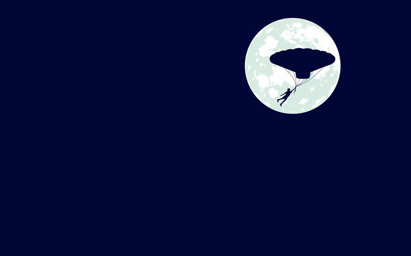 Parachutist against moon