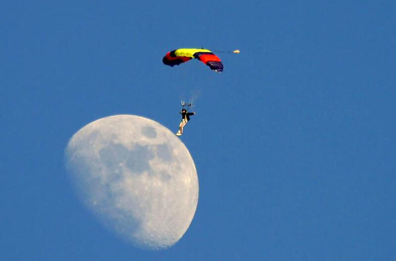 Parachutist with Moon