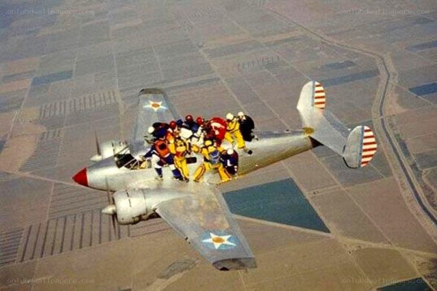 Parachutists boarding aircraft