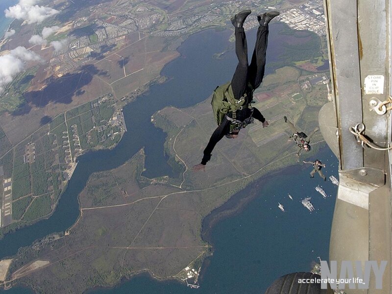 Parachutists Jumping from Plane