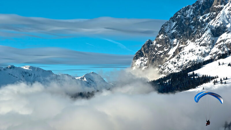 Paraglider in Mountains — Blue