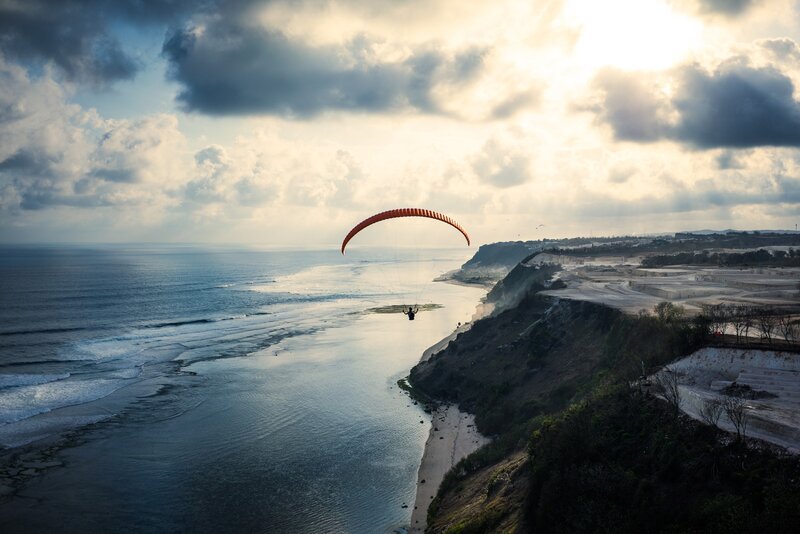 Paraglider over Coastline