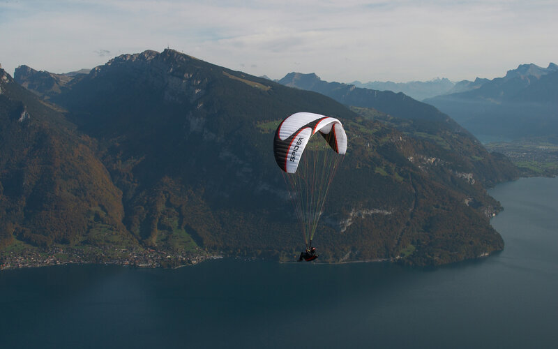 Paraglider over Lake — Blue