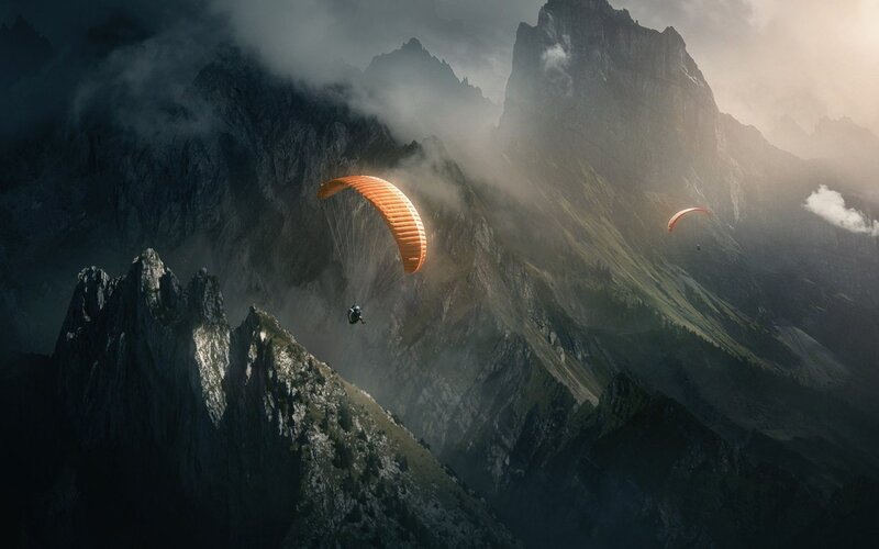 Paragliders in Mountains