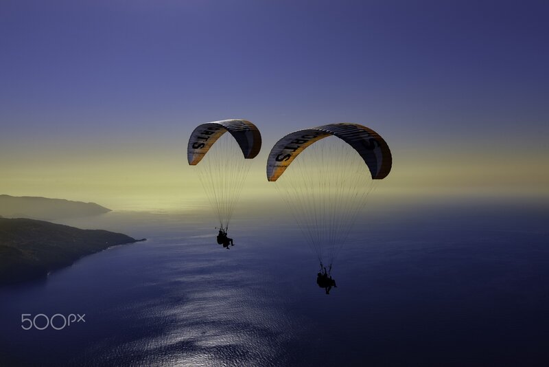 Paragliders over Ocean