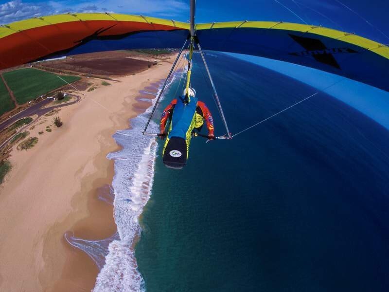 Paragliding over beach and ocean