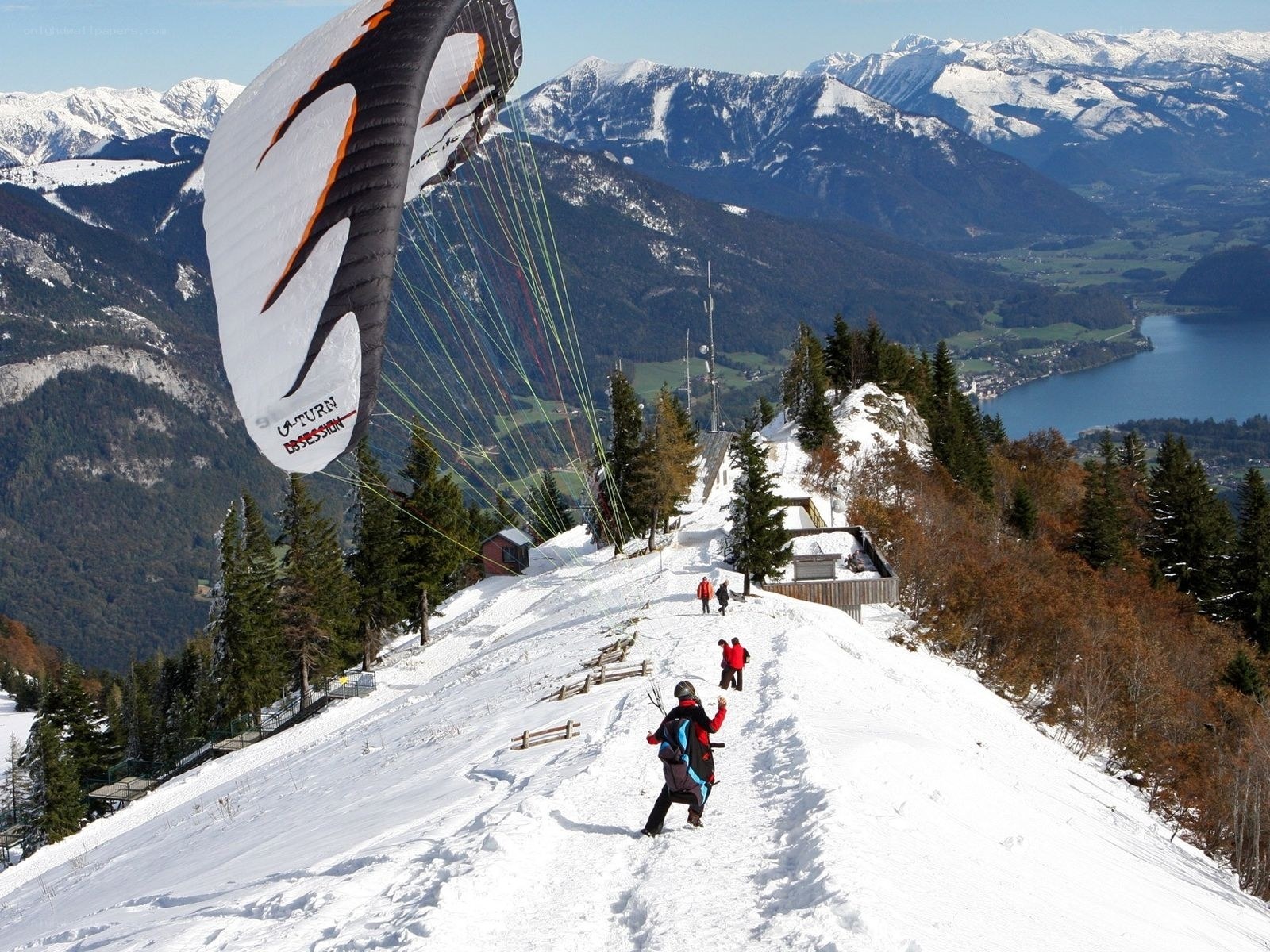Paragliding over snowy mountains