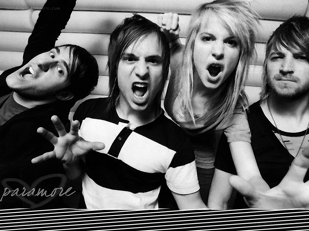 Paramore band members posing