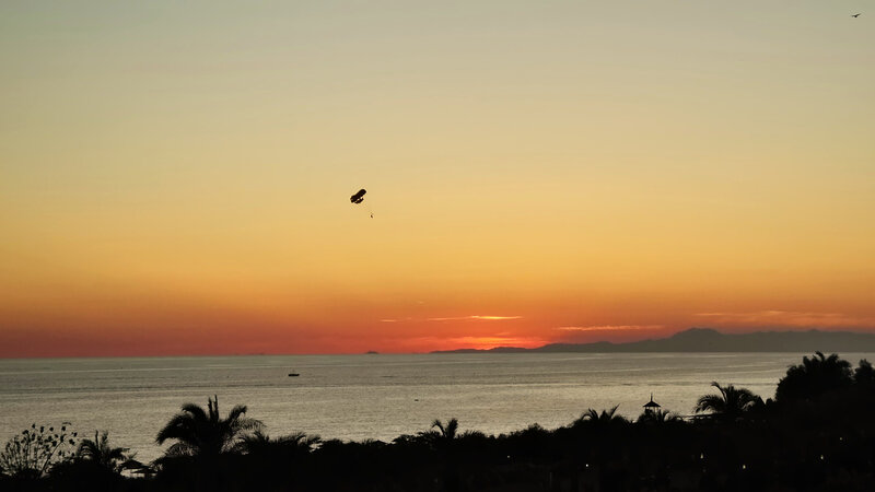 Parasail over Ocean — Orange