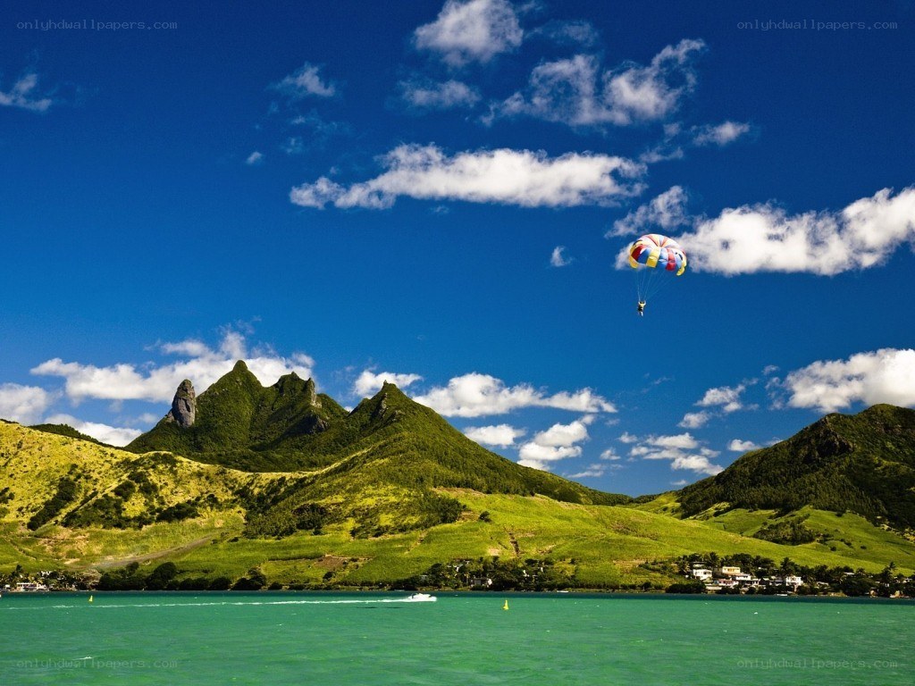 Parasailing over a tropical bay