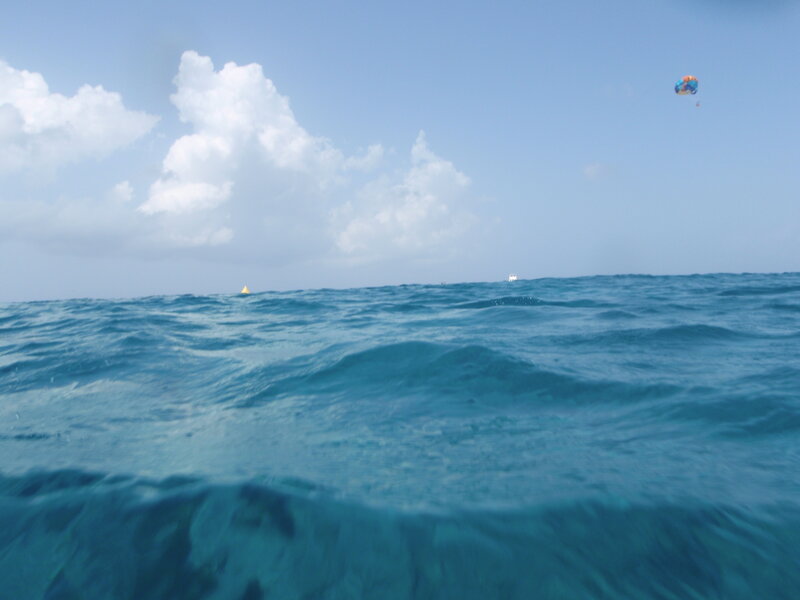 Parasailing over the ocean