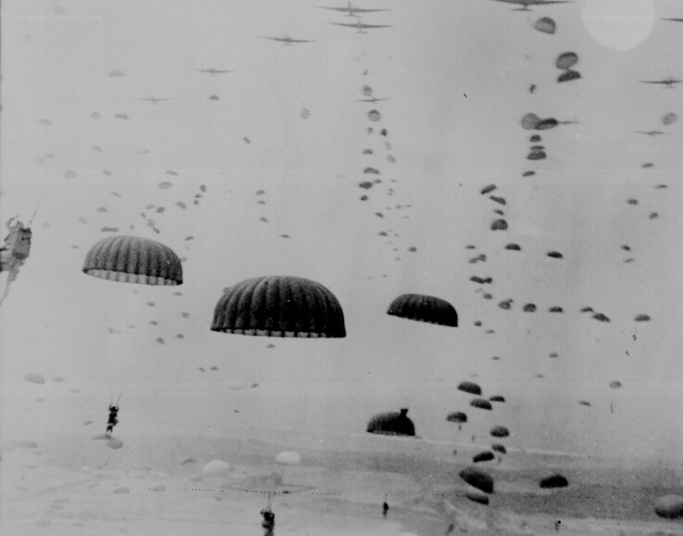 Paratroopers descending during D-Day