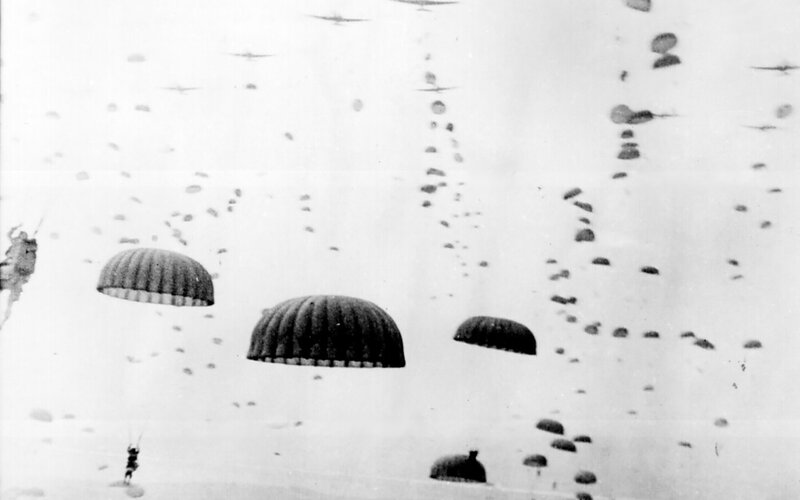Paratroopers descending in formation