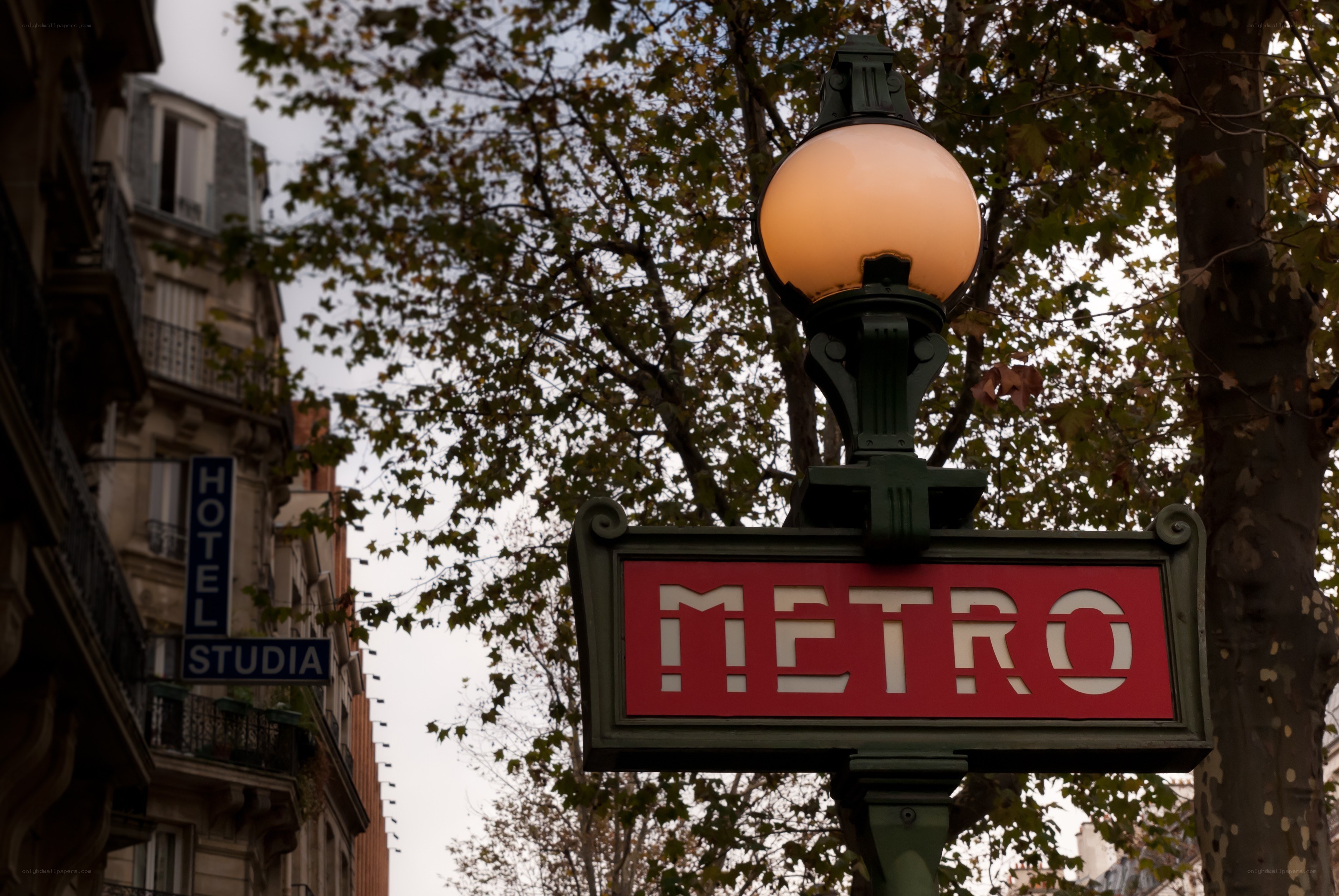 Paris Metro sign with lamp
