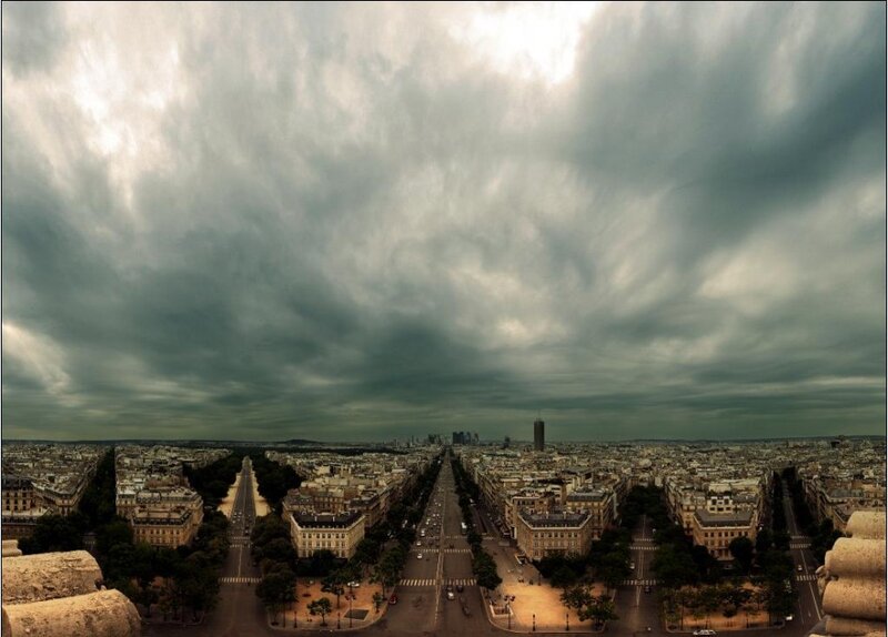 Paris skyline under stormy sky
