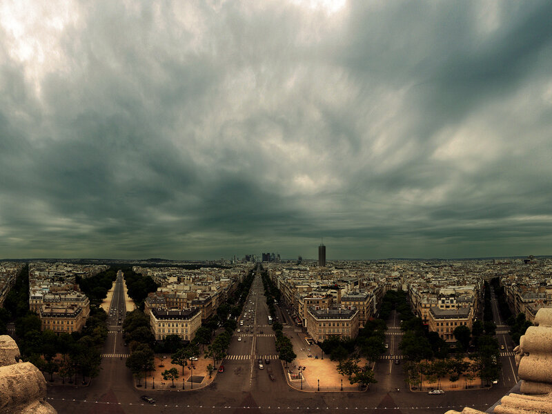 Paris skyline under stormy sky