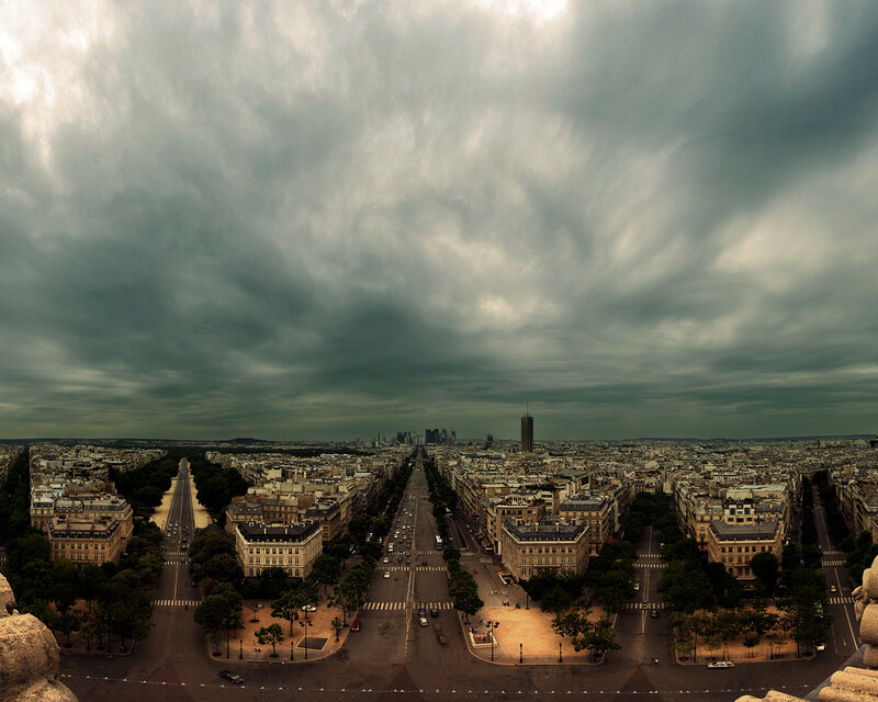 Paris skyline under stormy sky