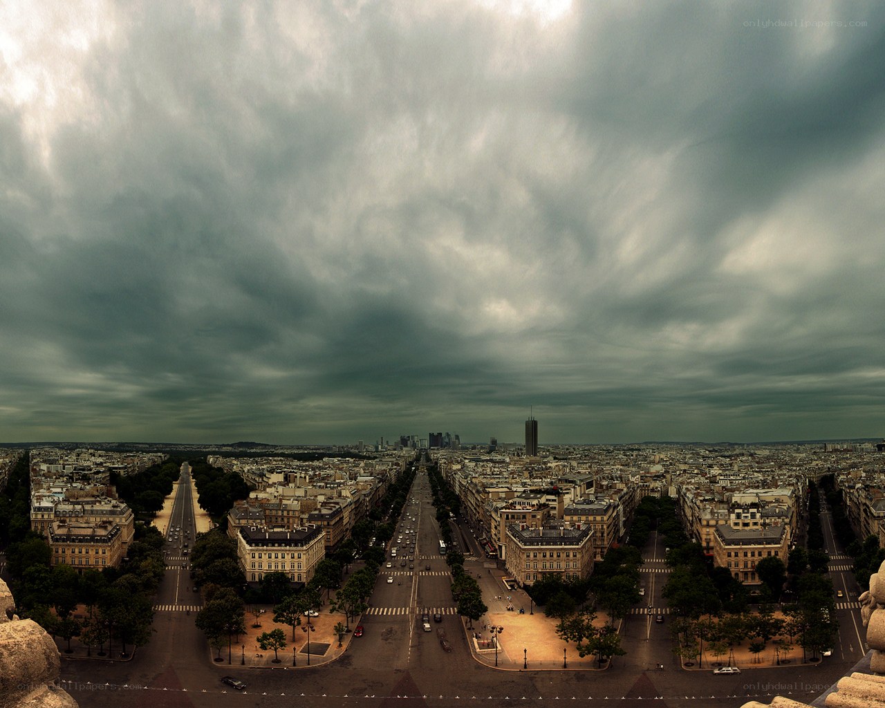Paris skyline under stormy sky