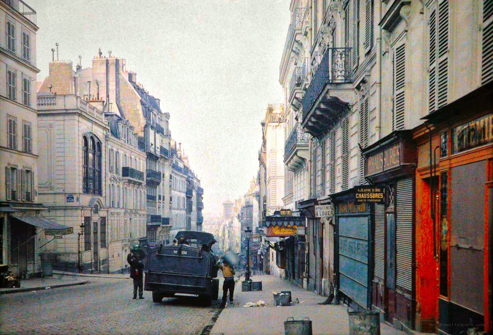Paris street scene with garbage truck