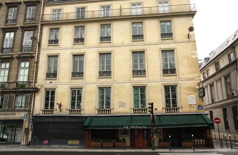 Parisian building with green awning