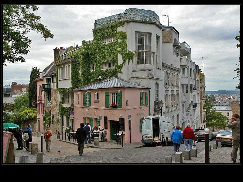 Parisian street scene with ivy-covered building