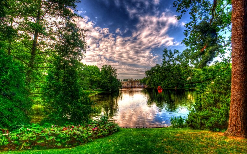 Park lake with classical building