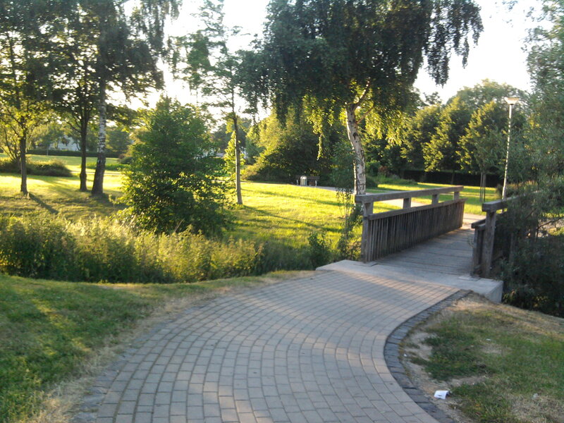 Park path and wooden bridge