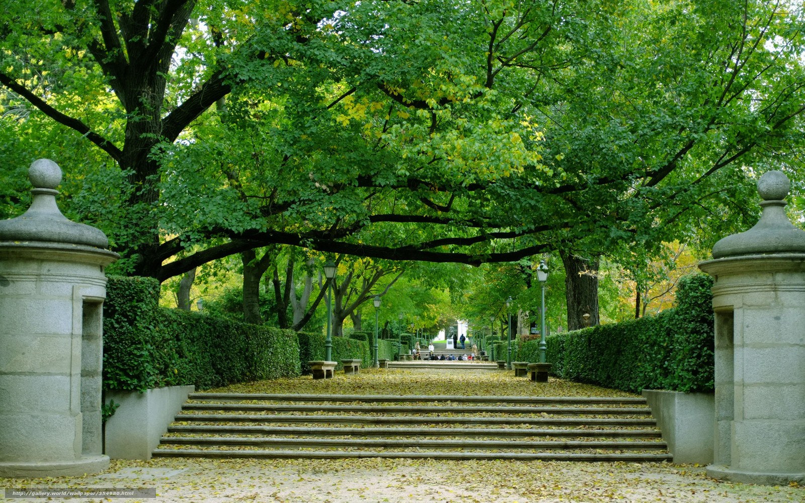 Park pathway with stone pillars