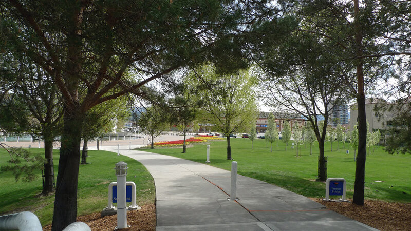 Park pathway with trees and flowers